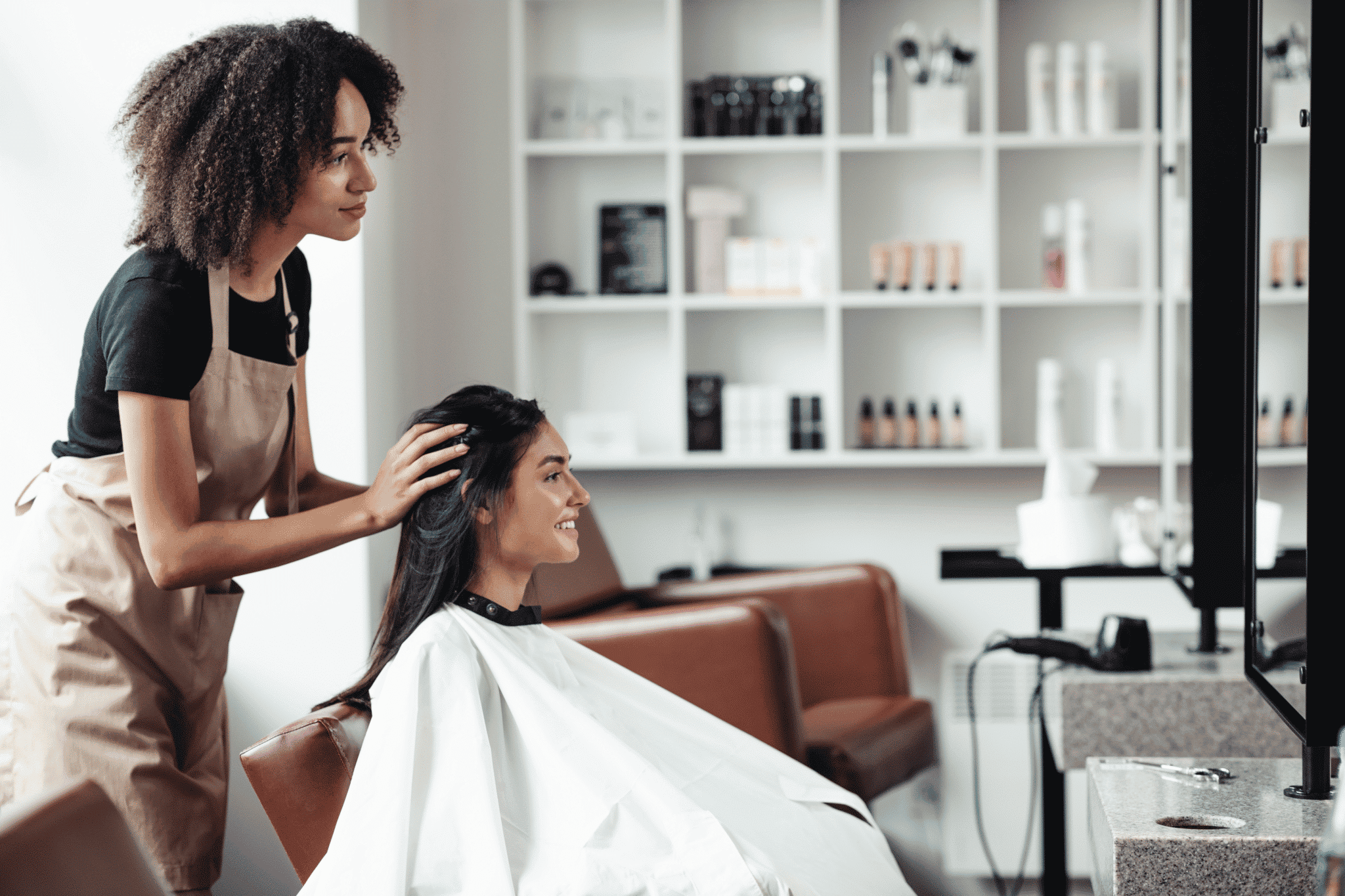 hair dresser salon serving and styling client hair
