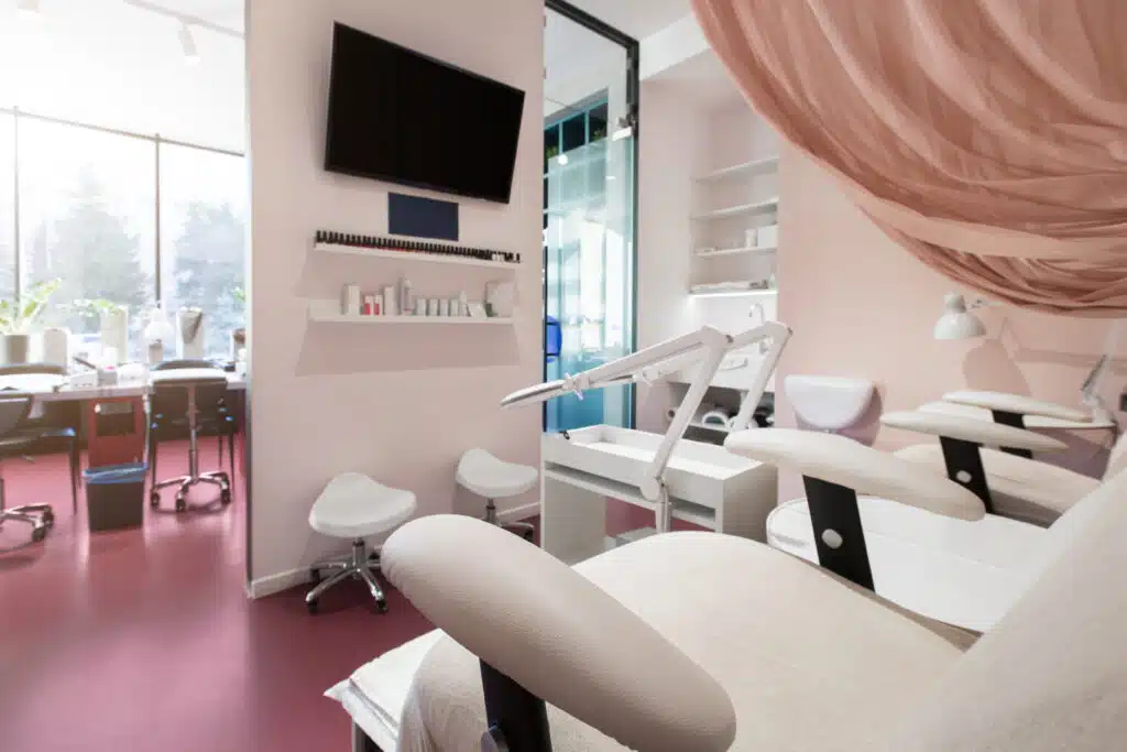 empty big nail salon interior with equipment and utensils