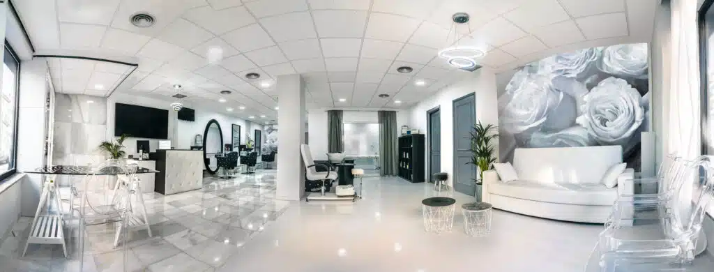 panoramic view of a modern bright beauty salon with nail services