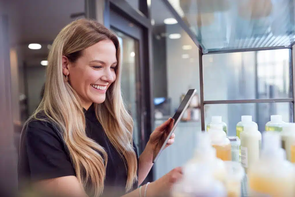 salon business woman checking products